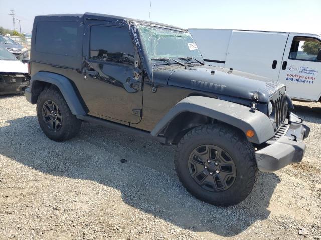 1C4AJWAG5GL100717 - 2016 JEEP WRANGLER SPORT Qara foto 4