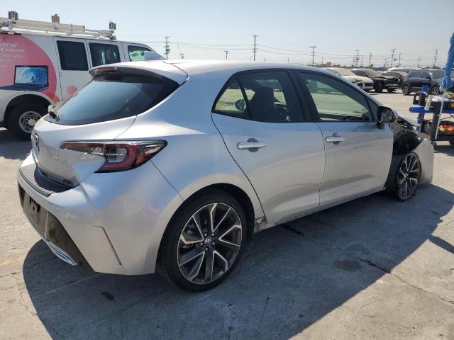 JTNK4RBEXK3050296 - 2019 TOYOTA COROLLA SE Сріблястий фото 3