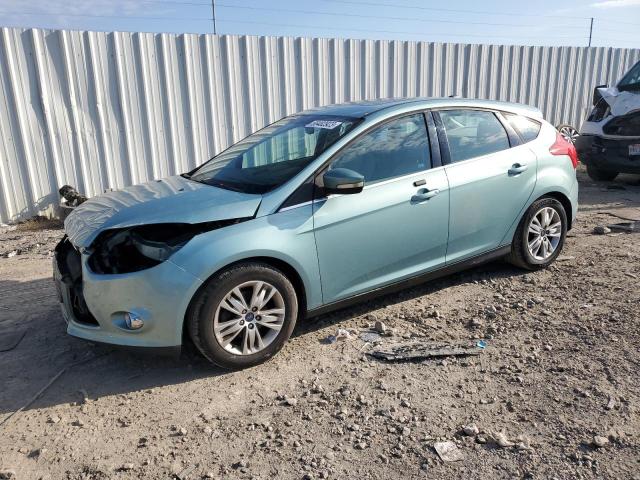 1FAHP3M22CL171997 - 2012 FORD FOCUS SEL TURQUOISE photo 1