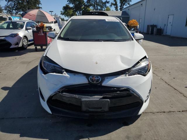 5YFBURHE4KP898922 - 2019 TOYOTA COROLLA L WHITE photo 5