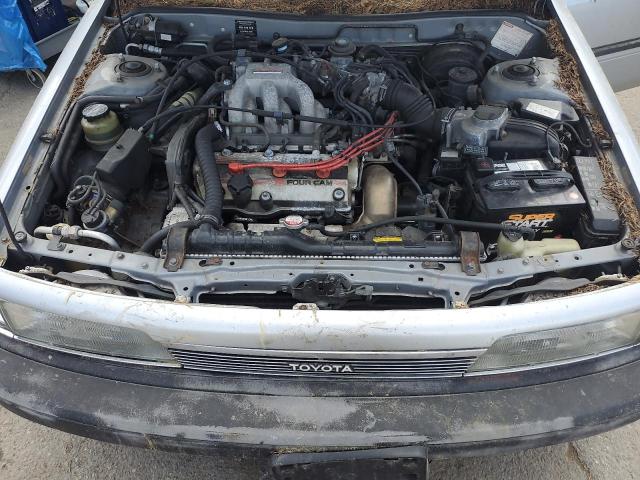 4T1VV21E0LU002739 - 1990 TOYOTA CAMRY DLX SILVER photo 11