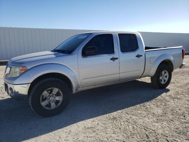 1N6AD0FR7AC417823 - 2010 NISSAN FRONTIER CREW CAB SE SILVER photo 1