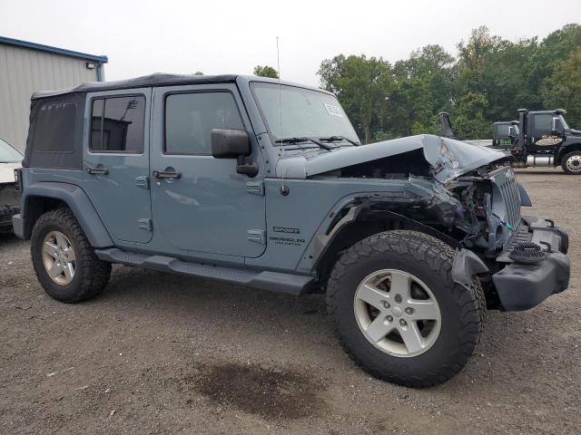 1C4BJWDG7EL319174 - 2014 JEEP WRANGLER U SPORT GRAY photo 4