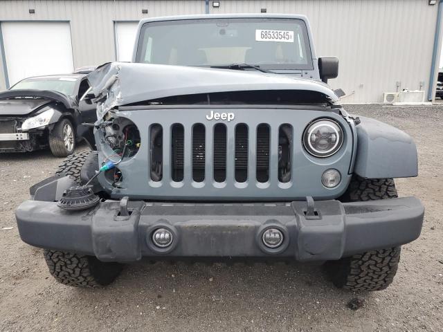 1C4BJWDG7EL319174 - 2014 JEEP WRANGLER U SPORT GRAY photo 5