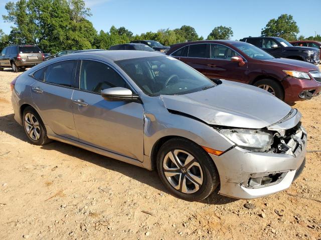 2HGFC2F53JH573957 - 2018 HONDA CIVIC LX SILVER photo 4