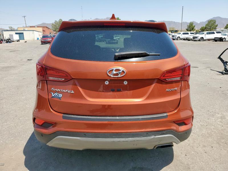 5XYZU3LB5JG518661 - 2018 HYUNDAI SANTA FE S ORANGE photo 6