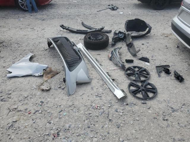 5YFEPMAE6MP212285 - 2021 TOYOTA COROLLA LE Gümüş foto 12