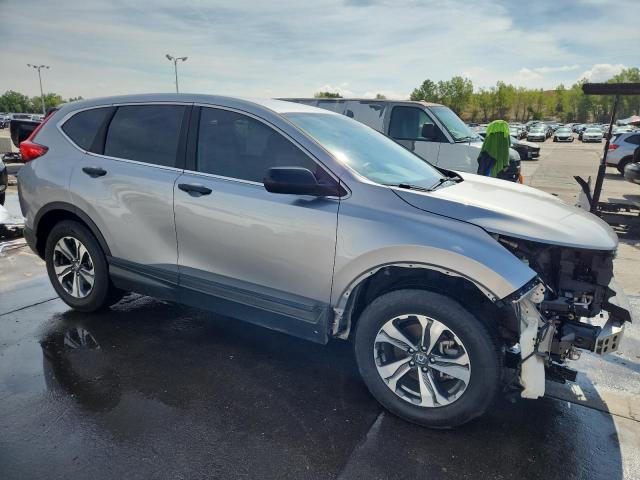 2HKRW5H35KH407643 - 2019 HONDA CR-V LX فضي صورة 4