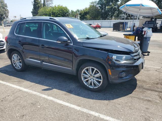 WVGAV3AX6EW573830 - 2014 VOLKSWAGEN TIGUAN S BLACK photo 4