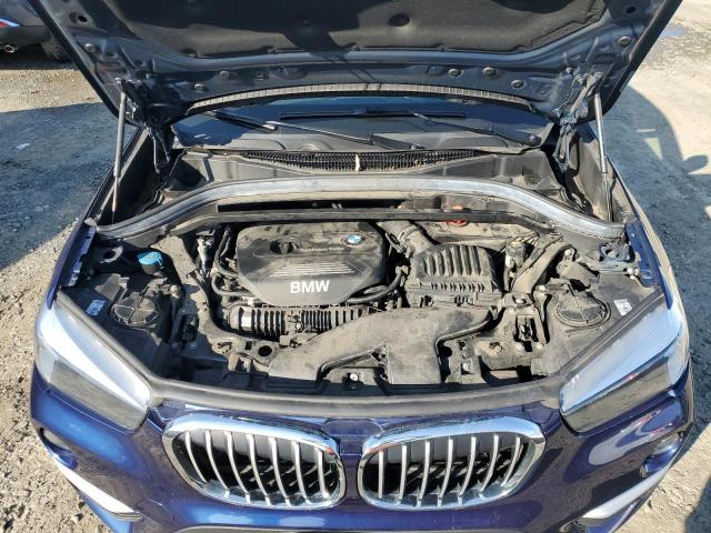 WBXHT3C34J5F90991 - 2018 BMW X1 XDRIVE28I BLUE photo 11