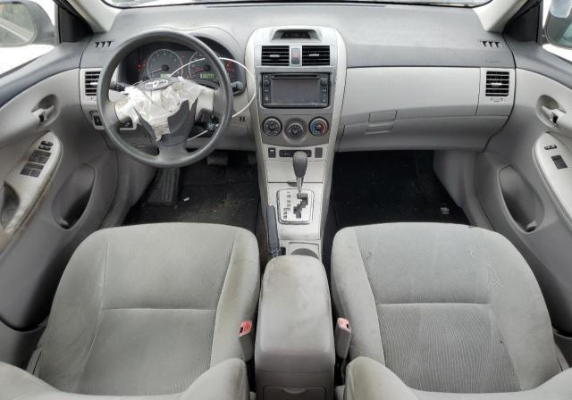 2T1BU4EE5DC946986 - 2013 TOYOTA COROLLA BASE Schwarz Foto 8