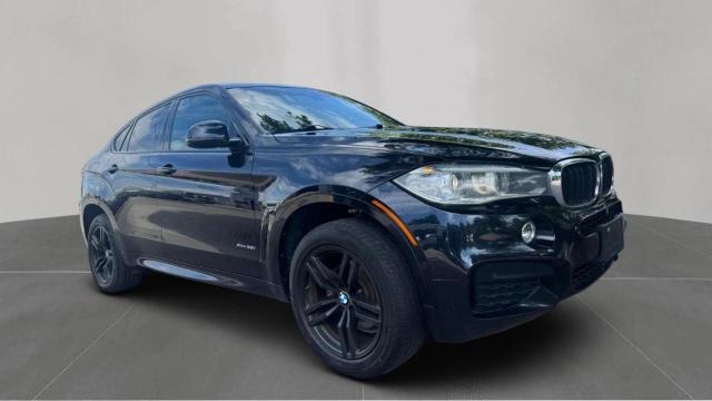 5UXKU2C50J0Z61424 - 2018 BMW X6 XDRIVE35I შავი ფოტო 1