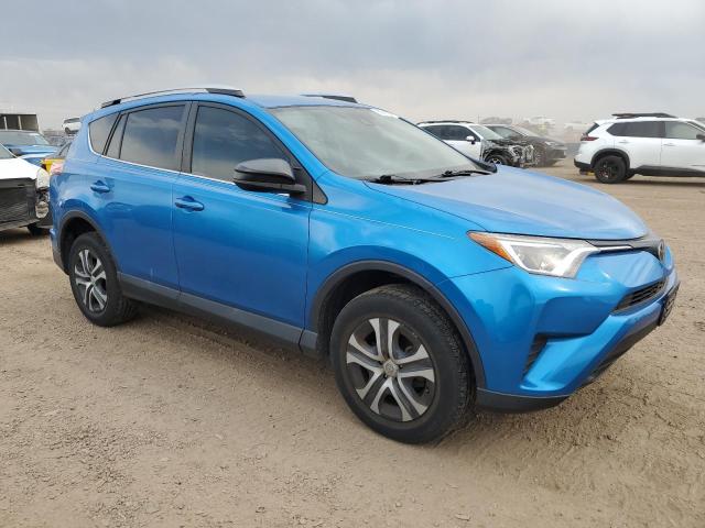 2T3ZFREV1HW334690 - 2017 TOYOTA RAV4 LE BLUE photo 4