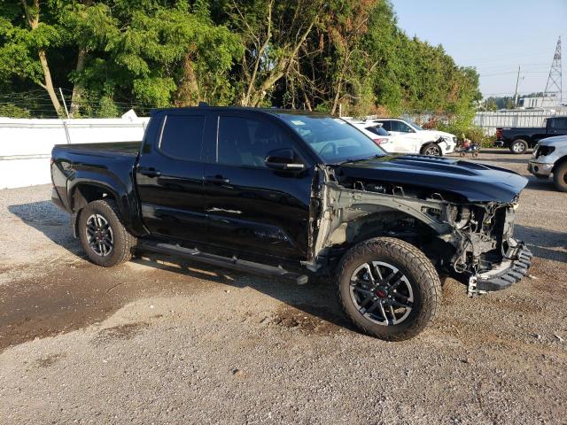 3TYLE5JN9ST061826 - 2025 TOYOTA TACOMA DOUBLE CAB BLACK photo 4