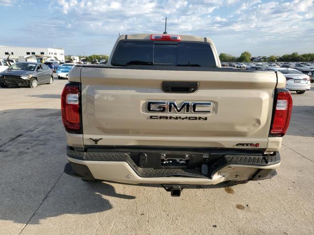 1GTP6DEK0P1184066 - 2023 GMC CANYON AT4 TAN photo 6