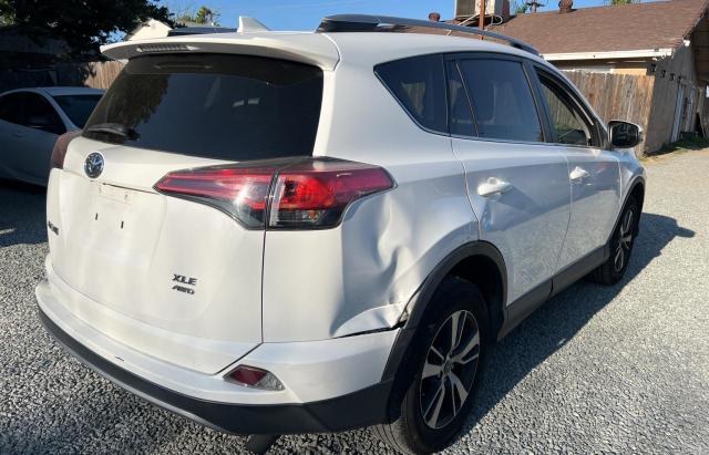 2T3RFREV0HW656849 - 2017 TOYOTA RAV4 XLE WHITE photo 4