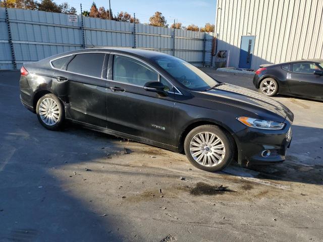 3FA6P0LUXDR220892 - 2013 FORD FUSION SE HYBRID BLACK photo 4