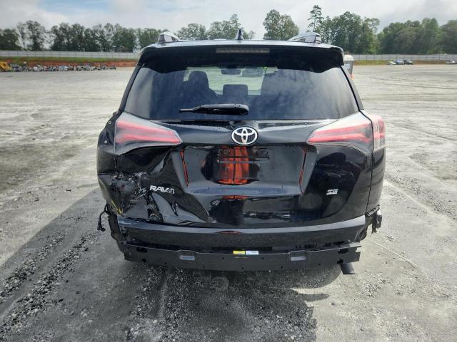 2T3NFREV4JW451023 - 2018 TOYOTA RAV4 SE შავი ფოტო 6