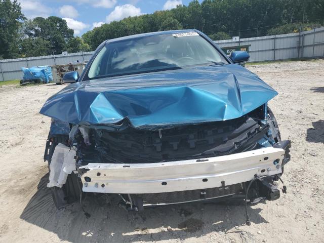4T1DAACK9SU114362 - 2025 TOYOTA CAMRY XSE BLUE photo 5