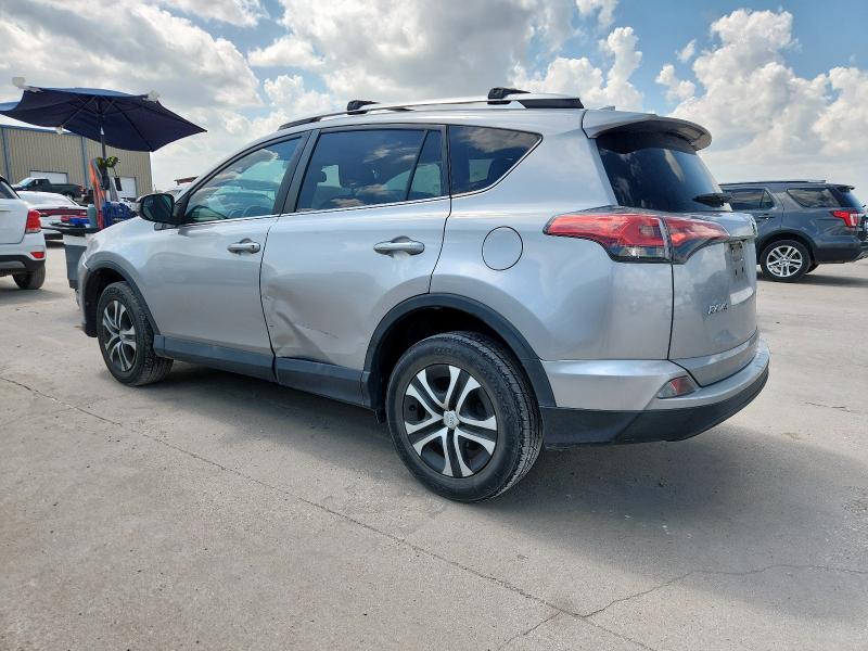 2T3ZFREV4GW275052 - 2016 TOYOTA RAV4 LE SILVER photo 2