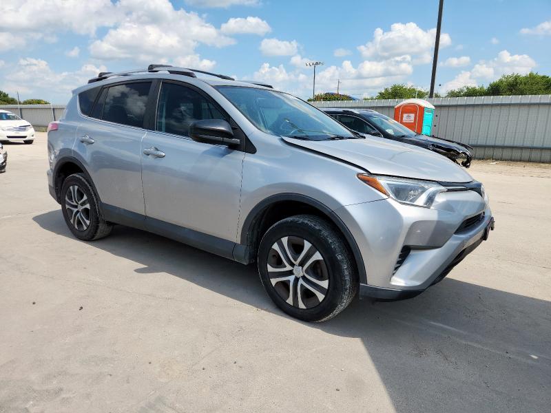 2T3ZFREV4GW275052 - 2016 TOYOTA RAV4 LE SILVER photo 4