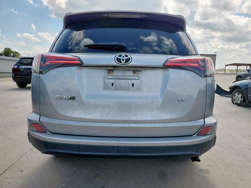2T3ZFREV4GW275052 - 2016 TOYOTA RAV4 LE SILVER photo 6