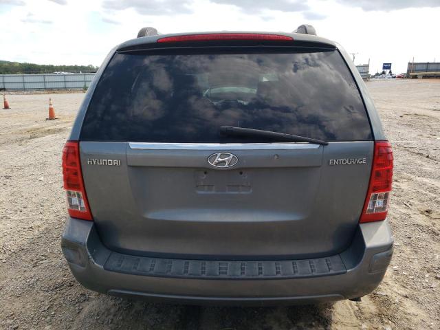 KNDMC233776024054 - 2007 HYUNDAI ENTOURAGE GLS BLUE photo 6