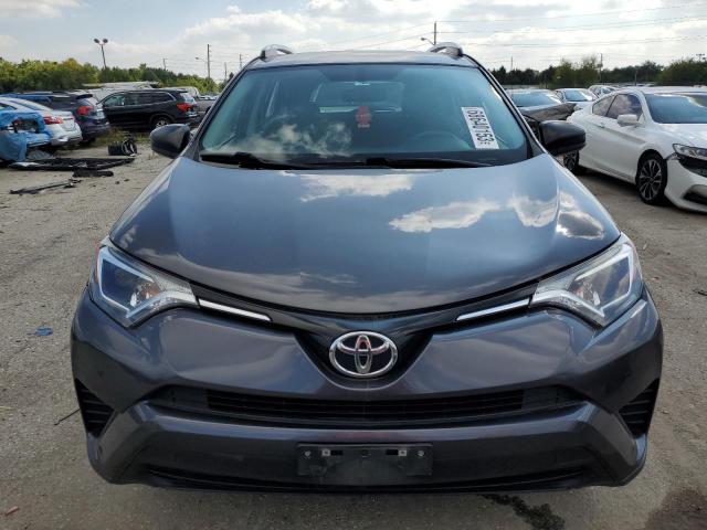 JTMBFREV3GJ097232 - 2016 TOYOTA RAV4 LE GRAY photo 5