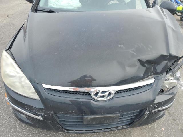 KMHDC86EX9U041117 - 2009 HYUNDAI ELANTRA TO BLACK photo 11