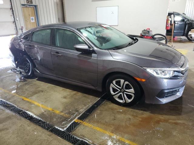 2HGFC2F52HH552687 - 2017 HONDA CIVIC LX ნაცრისფერი ფოტო 4