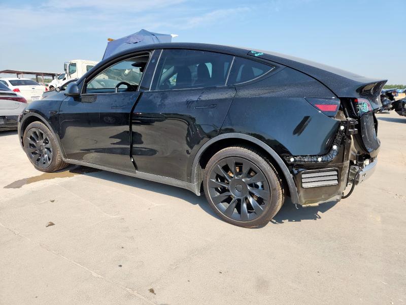 7SAYGAEE2SF302261 - 2025 TESLA MODEL Y Schwarz Foto 2