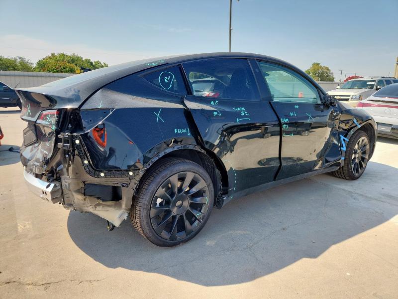 7SAYGAEE2SF302261 - 2025 TESLA MODEL Y Schwarz Foto 3
