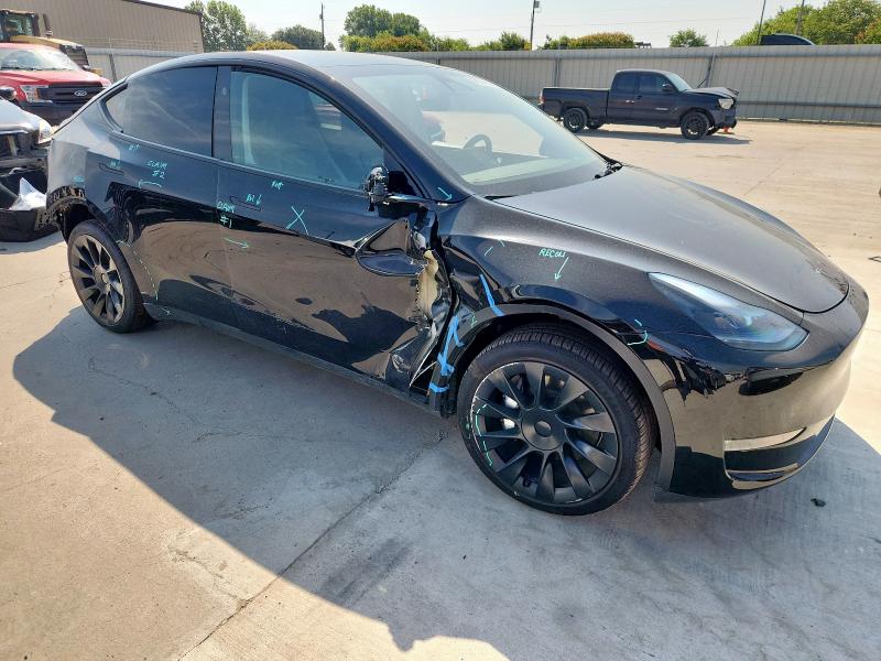7SAYGAEE2SF302261 - 2025 TESLA MODEL Y Schwarz Foto 4
