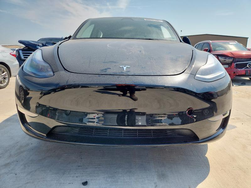 7SAYGAEE2SF302261 - 2025 TESLA MODEL Y Schwarz Foto 5