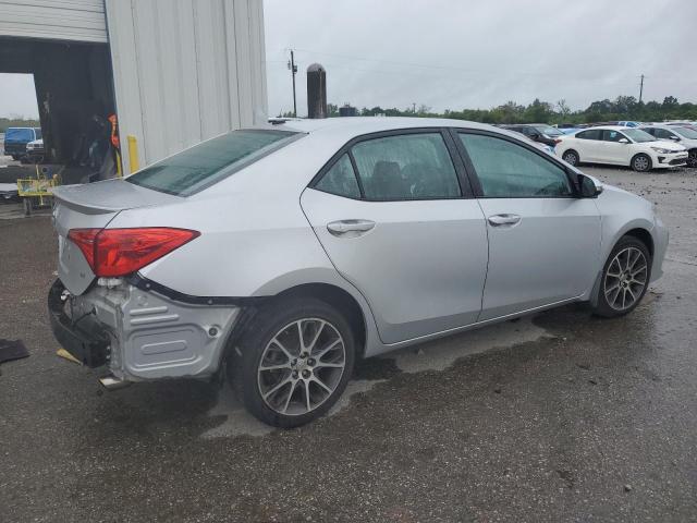5YFBURHE2HP623509 - 2017 TOYOTA COROLLA L SILVER photo 3