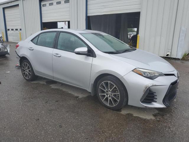 5YFBURHE2HP623509 - 2017 TOYOTA COROLLA L SILVER photo 4