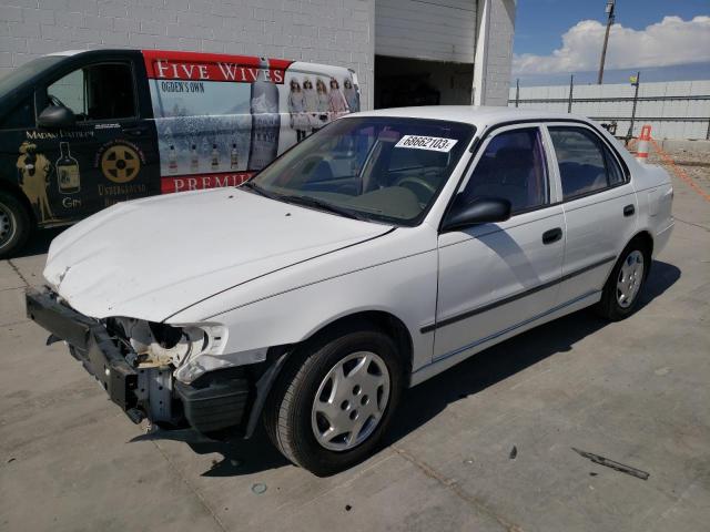 2T1BR12E6YC328795 - 2000 TOYOTA COROLLA VE WHITE photo 1