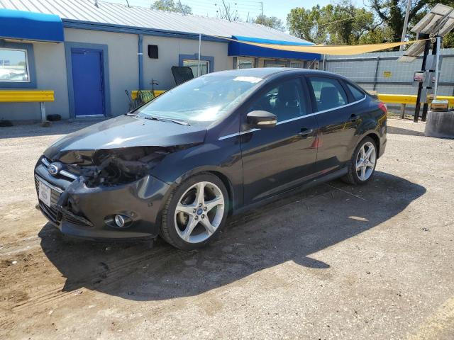 1FAHP3J28CL174925 - 2012 FORD FOCUS TITANIUM BLACK photo 1