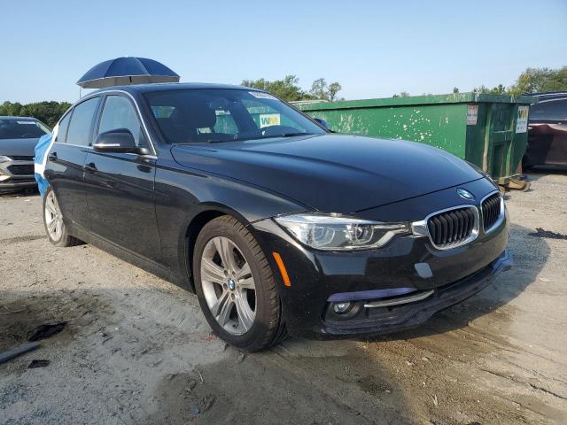 WBA8D9G52JNU68665 - 2018 BMW 330 XI BLACK photo 4