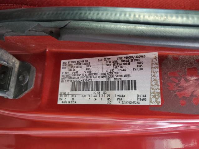 1FTSE34S32HB31628 - 2002 FORD ECONOLINE E350 SUPER DUTY VAN RED photo 13