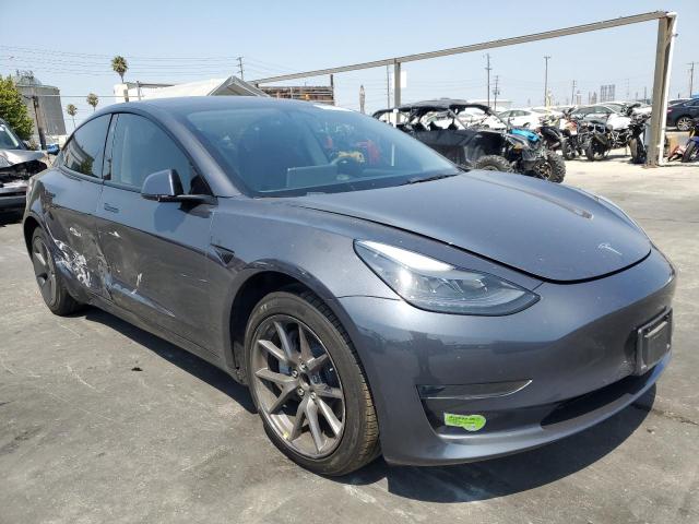 5YJ3E1EA8PF423779 - 2023 TESLA MODEL 3 GRAY photo 4