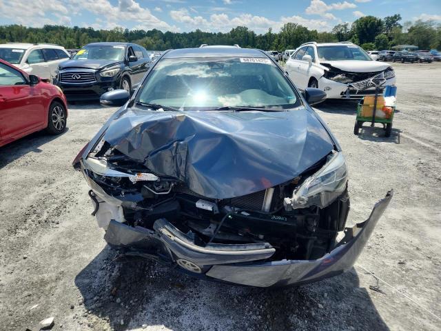 5YFBURHE1HP624957 - 2017 TOYOTA COROLLA L Gris foto 5