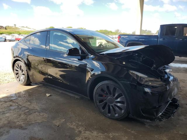 7SAYGDEF3SA369877 - 2025 TESLA MODEL Y BLACK photo 4