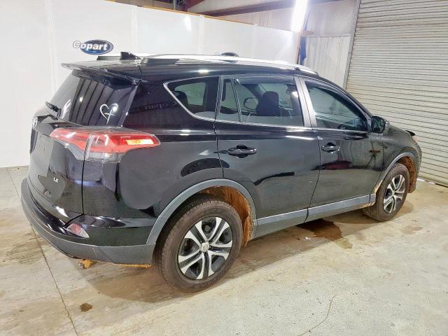 2T3ZFREV6JW494229 - 2018 TOYOTA RAV4 LE Qara foto 3
