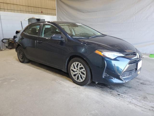 2T1BURHE1HC838055 - 2017 TOYOTA COROLLA L Blau Foto 4