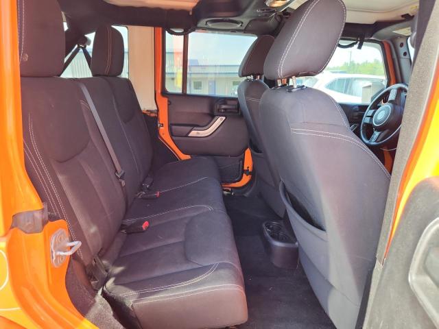 1C4BJWEG6DL504412 - 2013 JEEP WRANGLER U SAHARA Նարնջագույն լուսանկար 10