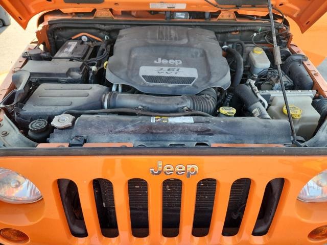 1C4BJWEG6DL504412 - 2013 JEEP WRANGLER U SAHARA Նարնջագույն լուսանկար 11
