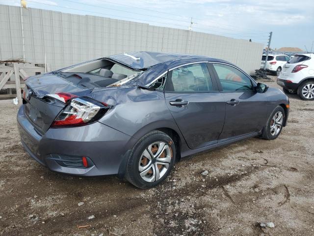 2HGFC2F59JH599883 - 2018 HONDA CIVIC LX ნაცრისფერი ფოტო 3