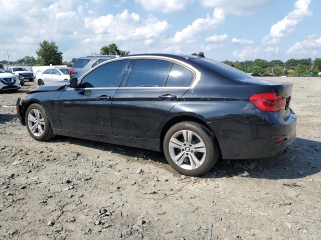 WBA8D9G39HNU64170 - 2017 BMW 330 XI BLACK photo 2
