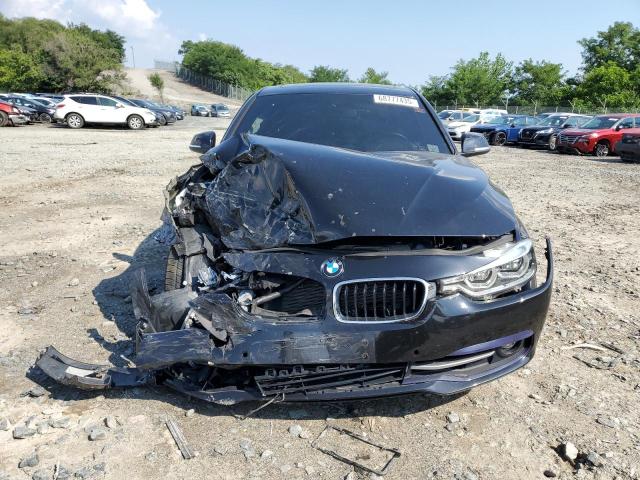 WBA8D9G39HNU64170 - 2017 BMW 330 XI BLACK photo 5